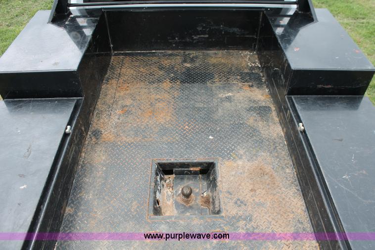 image for item K8910 2012 Dodge Ram 3500HD Laramie Quad Cab flatbed pickup truck