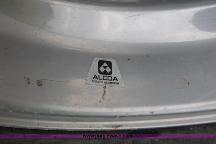 image for item K8910 2012 Dodge Ram 3500HD Laramie Quad Cab flatbed pickup truck