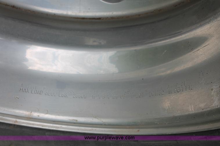 image for item K8910 2012 Dodge Ram 3500HD Laramie Quad Cab flatbed pickup truck