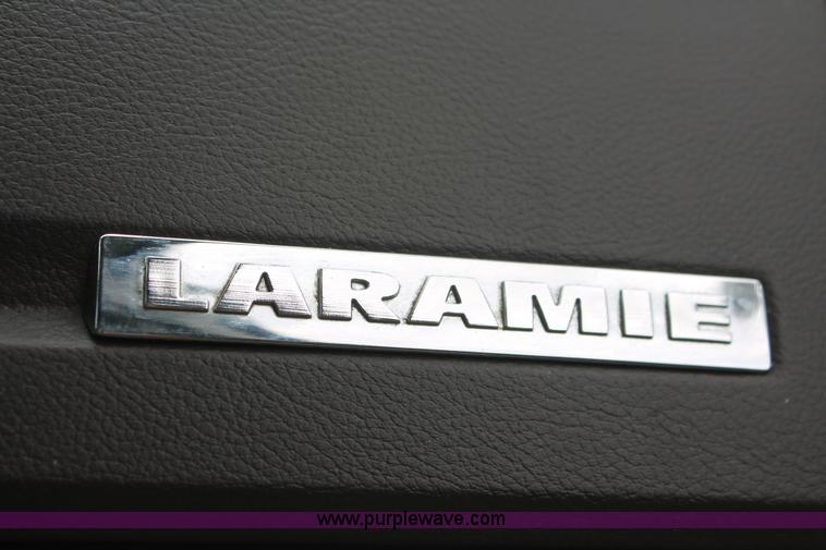 image for item K8910 2012 Dodge Ram 3500HD Laramie Quad Cab flatbed pickup truck