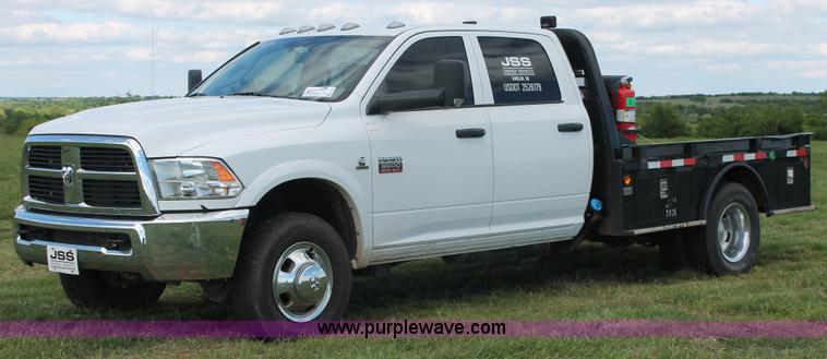 image for item K8911 2012 Dodge Ram 3500HD Quad Cab flatbed pickup truck