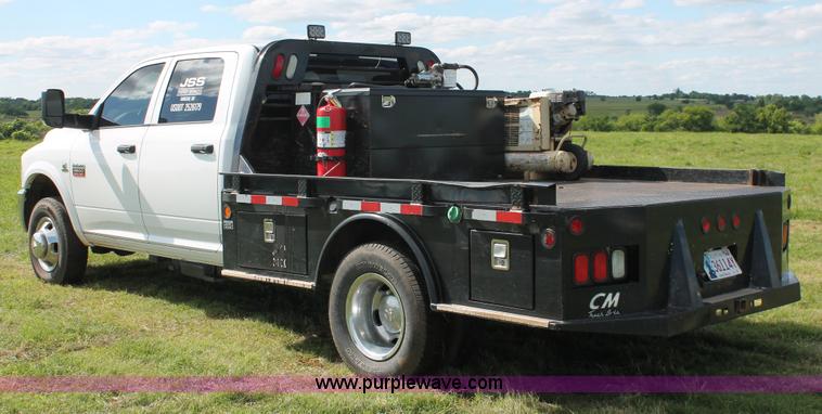 image for item K8911 2012 Dodge Ram 3500HD Quad Cab flatbed pickup truck