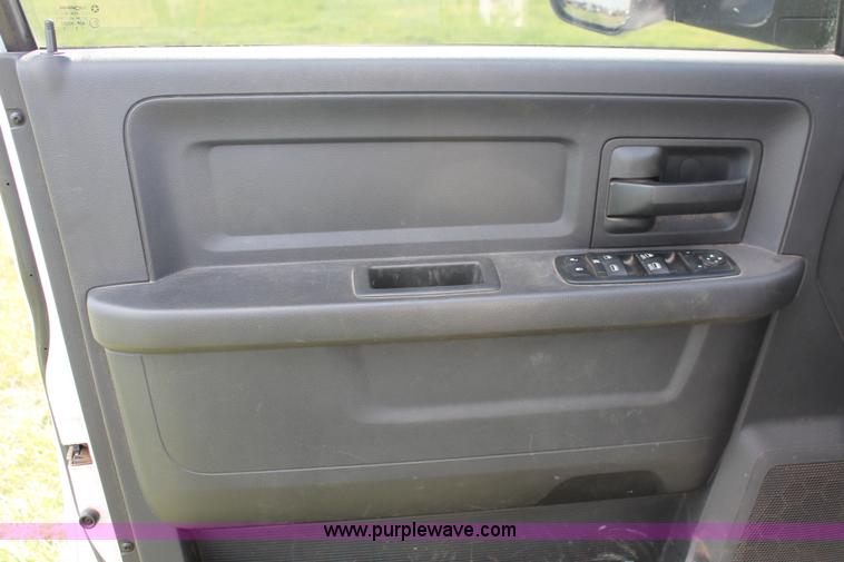 image for item K8911 2012 Dodge Ram 3500HD Quad Cab flatbed pickup truck