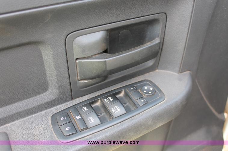 image for item K8911 2012 Dodge Ram 3500HD Quad Cab flatbed pickup truck