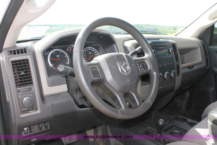 image for item K8911 2012 Dodge Ram 3500HD Quad Cab flatbed pickup truck