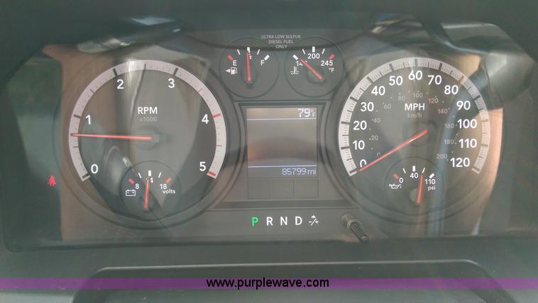 image for item K8911 2012 Dodge Ram 3500HD Quad Cab flatbed pickup truck