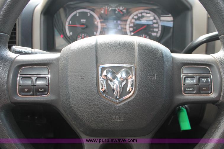 image for item K8911 2012 Dodge Ram 3500HD Quad Cab flatbed pickup truck