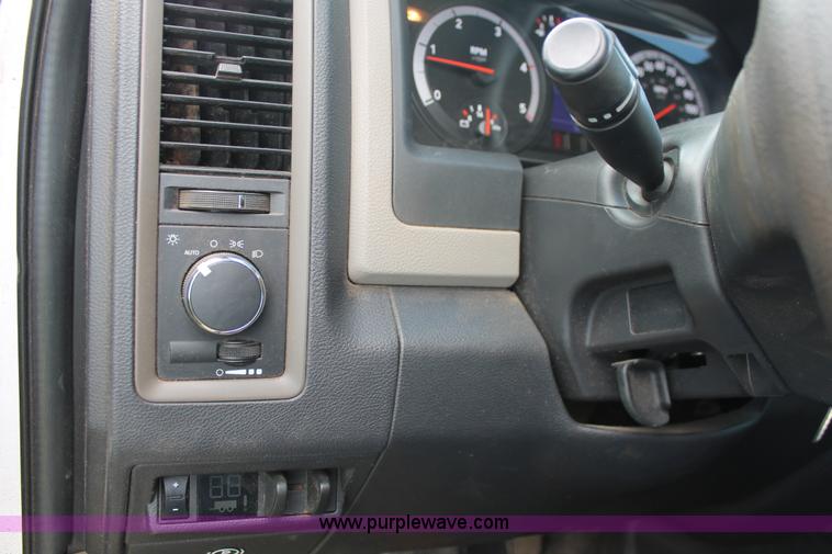 image for item K8911 2012 Dodge Ram 3500HD Quad Cab flatbed pickup truck