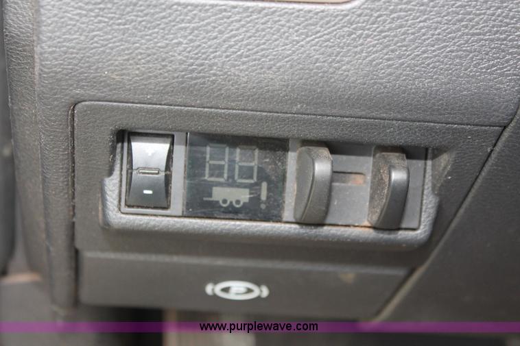 image for item K8911 2012 Dodge Ram 3500HD Quad Cab flatbed pickup truck