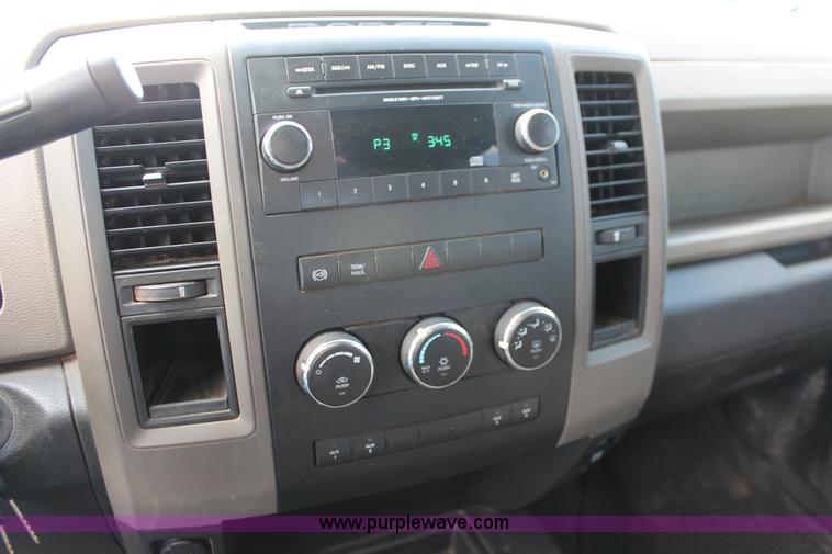 image for item K8911 2012 Dodge Ram 3500HD Quad Cab flatbed pickup truck