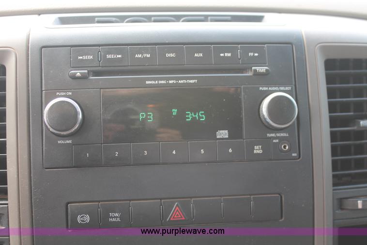 image for item K8911 2012 Dodge Ram 3500HD Quad Cab flatbed pickup truck