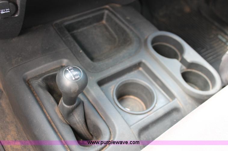 image for item K8911 2012 Dodge Ram 3500HD Quad Cab flatbed pickup truck