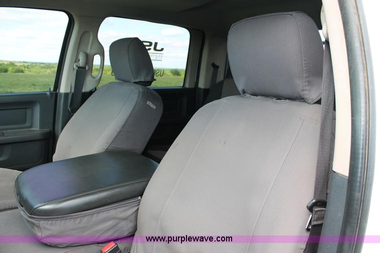 image for item K8911 2012 Dodge Ram 3500HD Quad Cab flatbed pickup truck