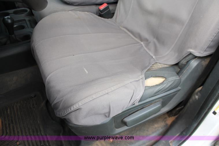 image for item K8911 2012 Dodge Ram 3500HD Quad Cab flatbed pickup truck