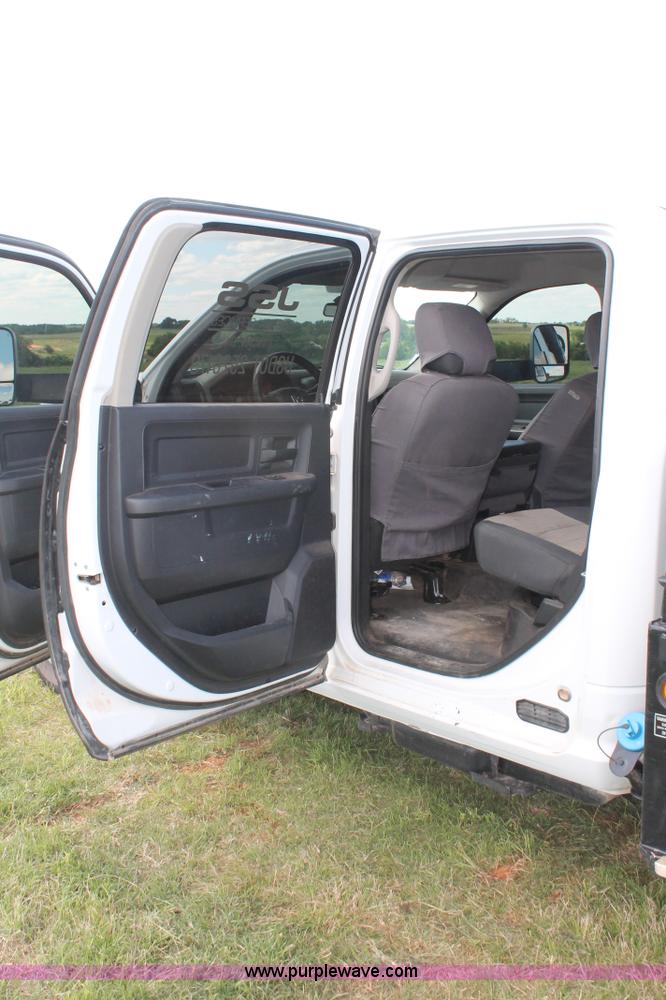 image for item K8911 2012 Dodge Ram 3500HD Quad Cab flatbed pickup truck