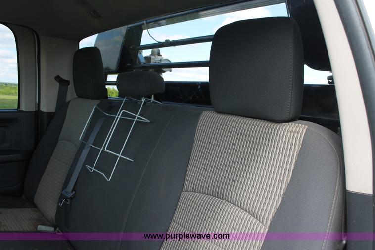 image for item K8911 2012 Dodge Ram 3500HD Quad Cab flatbed pickup truck