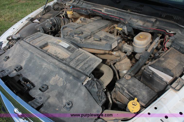 image for item K8911 2012 Dodge Ram 3500HD Quad Cab flatbed pickup truck