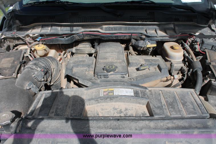 image for item K8911 2012 Dodge Ram 3500HD Quad Cab flatbed pickup truck