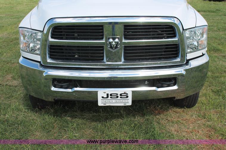 image for item K8911 2012 Dodge Ram 3500HD Quad Cab flatbed pickup truck