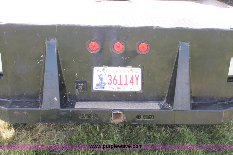 image for item K8911 2012 Dodge Ram 3500HD Quad Cab flatbed pickup truck