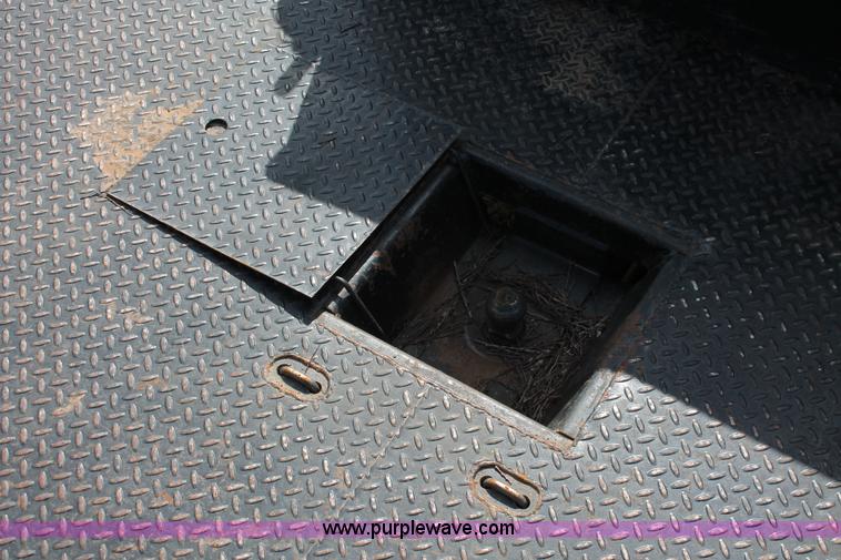 image for item K8911 2012 Dodge Ram 3500HD Quad Cab flatbed pickup truck