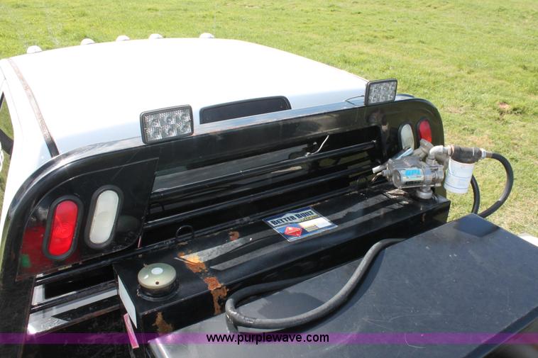 image for item K8911 2012 Dodge Ram 3500HD Quad Cab flatbed pickup truck