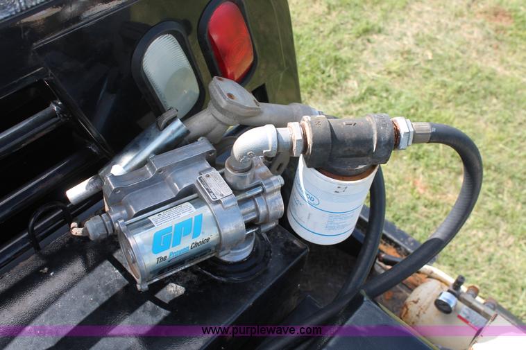 image for item K8911 2012 Dodge Ram 3500HD Quad Cab flatbed pickup truck