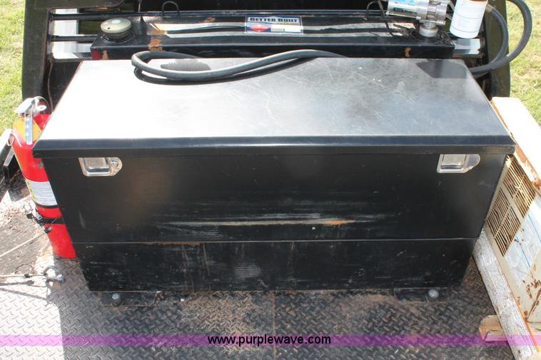 image for item K8911 2012 Dodge Ram 3500HD Quad Cab flatbed pickup truck