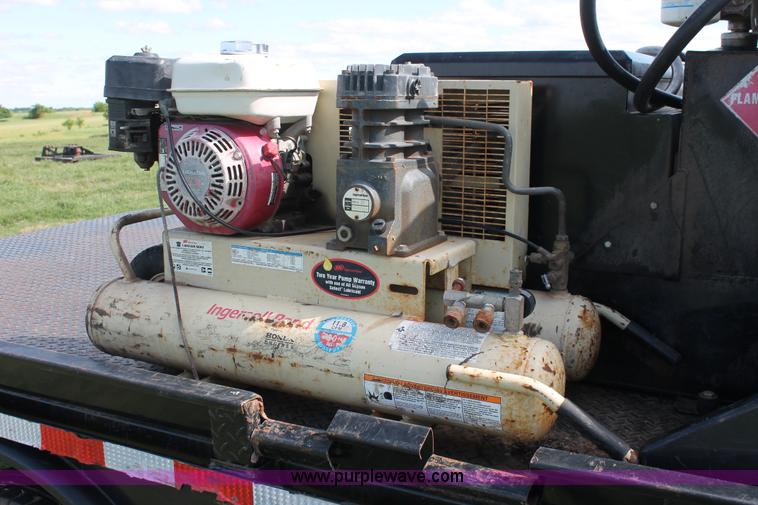 image for item K8911 2012 Dodge Ram 3500HD Quad Cab flatbed pickup truck