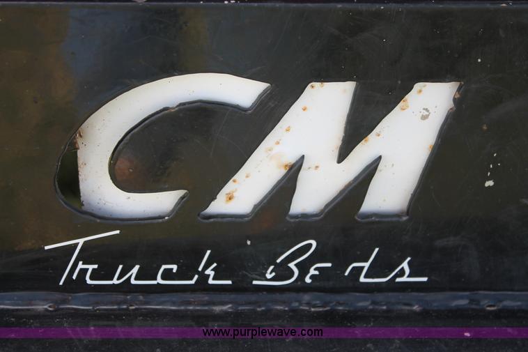 image for item K8911 2012 Dodge Ram 3500HD Quad Cab flatbed pickup truck