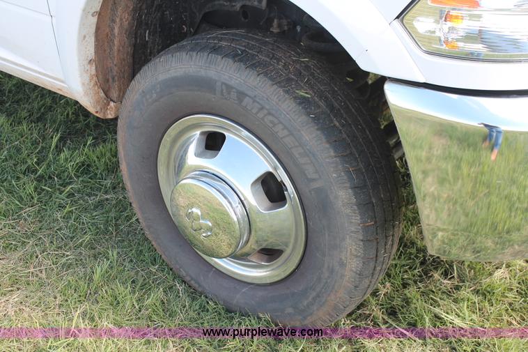 image for item K8911 2012 Dodge Ram 3500HD Quad Cab flatbed pickup truck