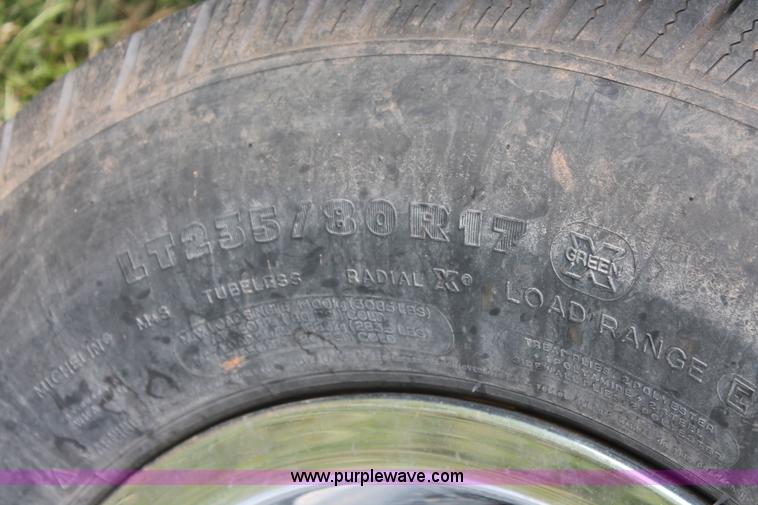 image for item K8911 2012 Dodge Ram 3500HD Quad Cab flatbed pickup truck