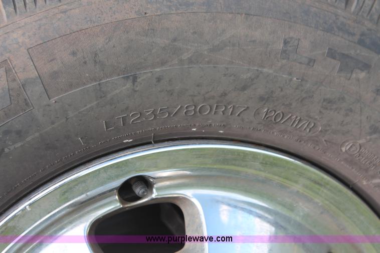 image for item K8911 2012 Dodge Ram 3500HD Quad Cab flatbed pickup truck