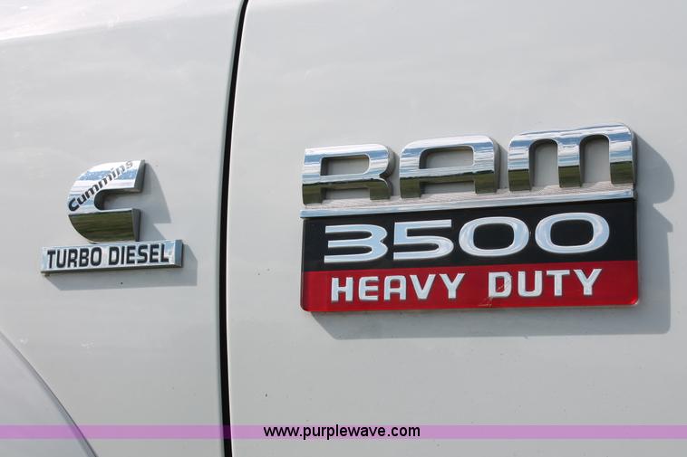 image for item K8911 2012 Dodge Ram 3500HD Quad Cab flatbed pickup truck