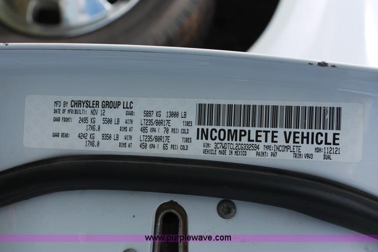 image for item K8911 2012 Dodge Ram 3500HD Quad Cab flatbed pickup truck