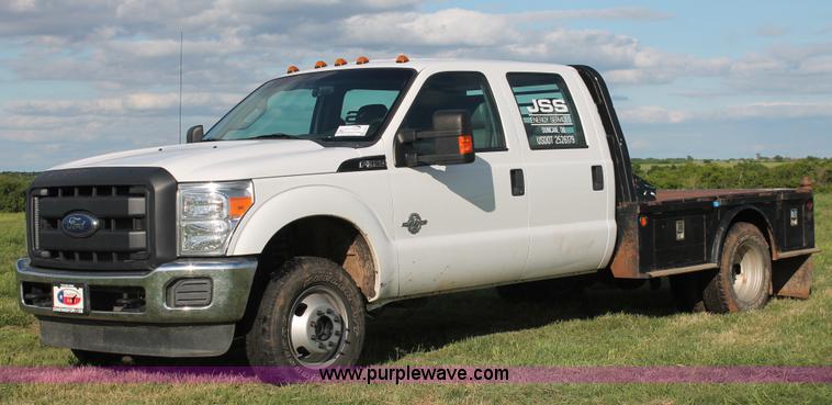 image for item K8912 2012 Ford F350  XL Super Duty Crew Cab flatbed pickup truck