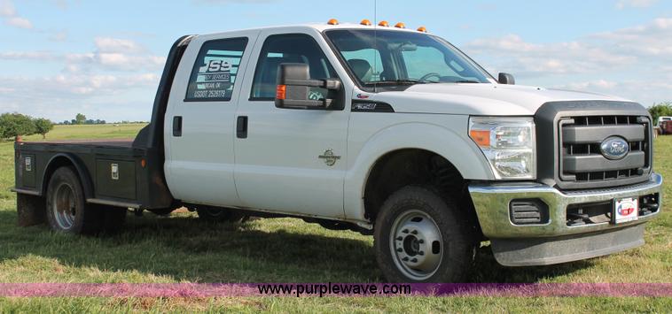 image for item K8912 2012 Ford F350  XL Super Duty Crew Cab flatbed pickup truck