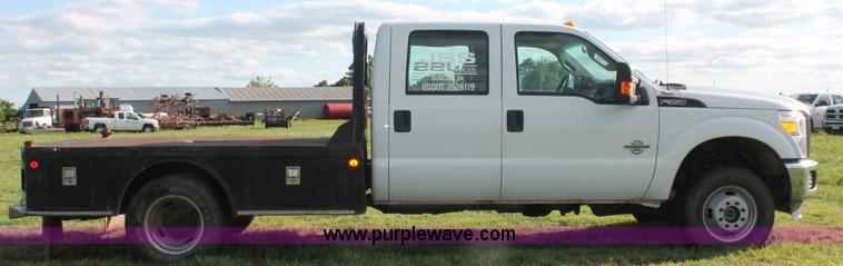 image for item K8912 2012 Ford F350  XL Super Duty Crew Cab flatbed pickup truck