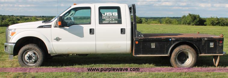image for item K8912 2012 Ford F350  XL Super Duty Crew Cab flatbed pickup truck
