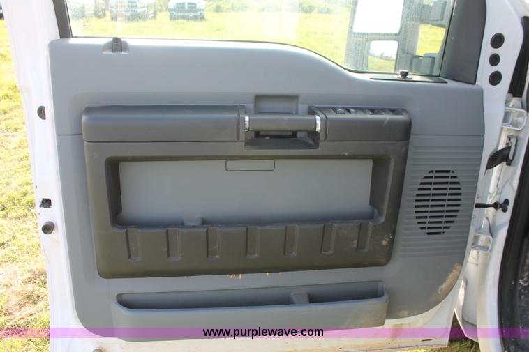 image for item K8912 2012 Ford F350  XL Super Duty Crew Cab flatbed pickup truck