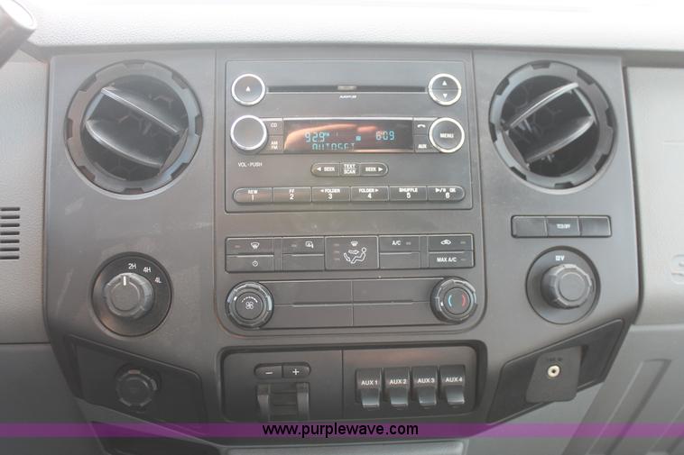 image for item K8912 2012 Ford F350  XL Super Duty Crew Cab flatbed pickup truck