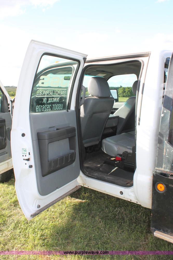 image for item K8912 2012 Ford F350  XL Super Duty Crew Cab flatbed pickup truck