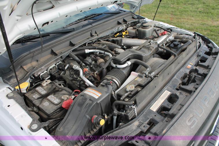 image for item K8912 2012 Ford F350  XL Super Duty Crew Cab flatbed pickup truck