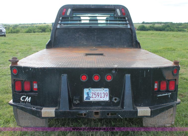 image for item K8912 2012 Ford F350  XL Super Duty Crew Cab flatbed pickup truck