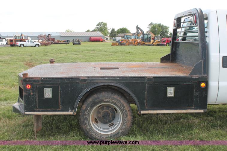 image for item K8912 2012 Ford F350  XL Super Duty Crew Cab flatbed pickup truck