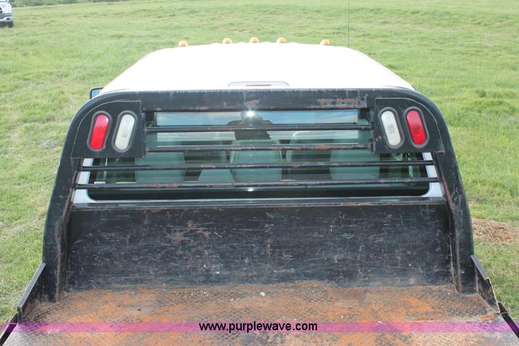 image for item K8912 2012 Ford F350  XL Super Duty Crew Cab flatbed pickup truck