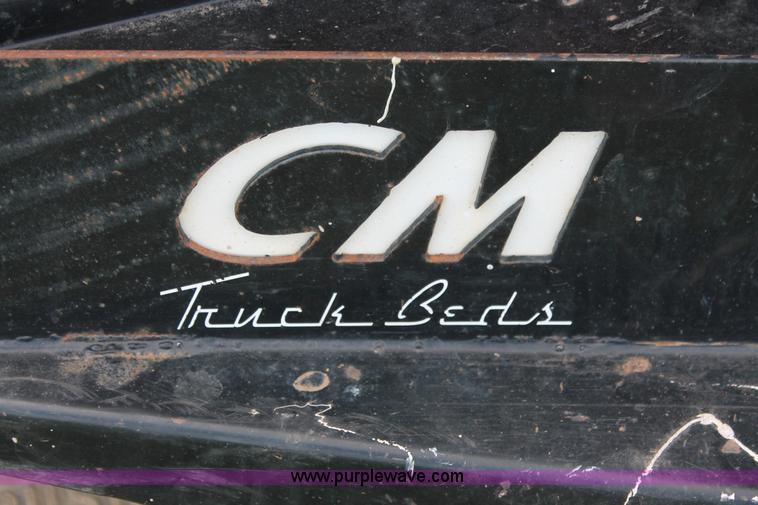 image for item K8912 2012 Ford F350  XL Super Duty Crew Cab flatbed pickup truck