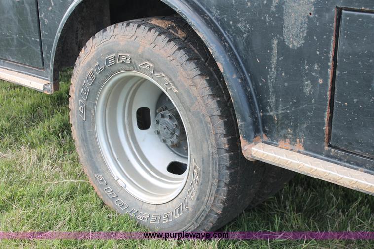 image for item K8912 2012 Ford F350  XL Super Duty Crew Cab flatbed pickup truck