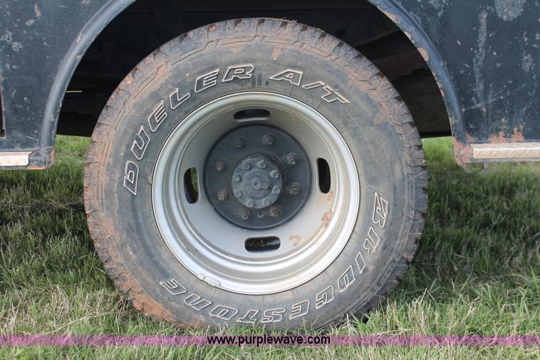 image for item K8912 2012 Ford F350  XL Super Duty Crew Cab flatbed pickup truck