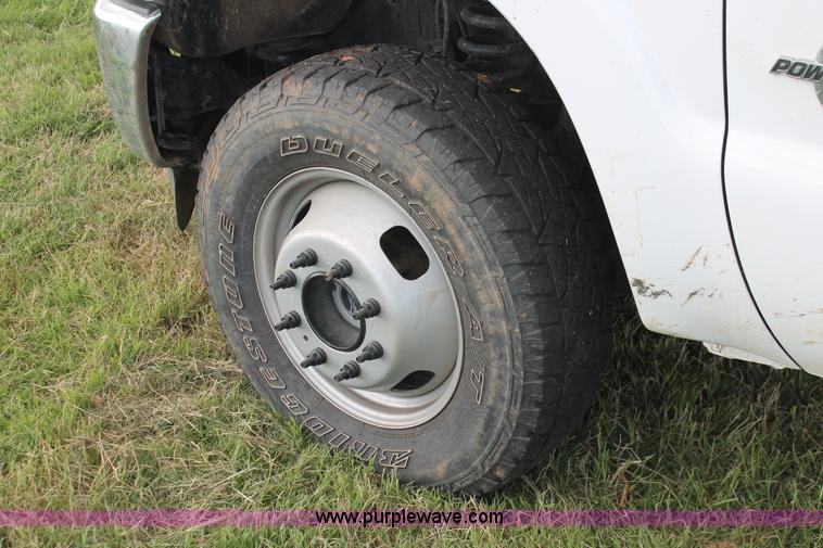 image for item K8912 2012 Ford F350  XL Super Duty Crew Cab flatbed pickup truck